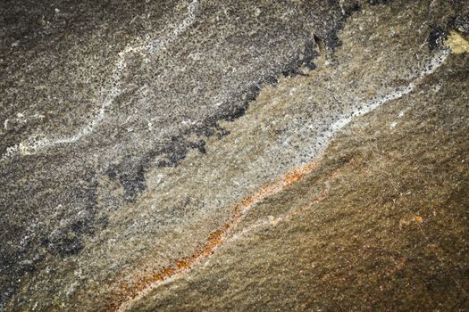 background or texture old prehistoric stone with a wavy line