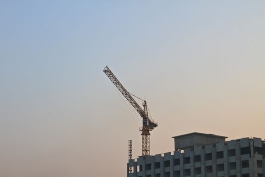 Construction site on sunset background