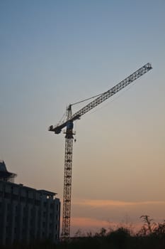 Construction site on sunset background