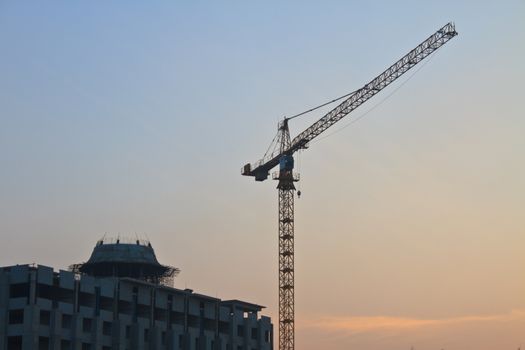 Construction site on sunset background