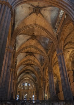Arcade with fan vault ceiling, Barcelona Cathedral, Spain. Barcelona Cathedral is situated in the Gothic quarters, not to be confused with Sagrada Familia. Barcelona, Spain.