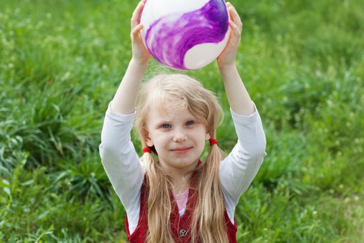 portrait of a girl with a ball