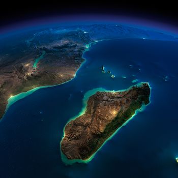 Highly detailed Earth, illuminated by moonlight. The glow of cities sheds light on the detailed exaggerated terrain. Night Earth. Africa and Madagascar. Elements of this image furnished by NASA