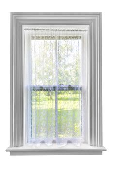 Window and sill with sheer lace curtains isolated on white background