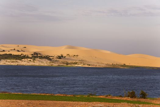 White sand dunes on sunrise, Mui Ne, Vietnam