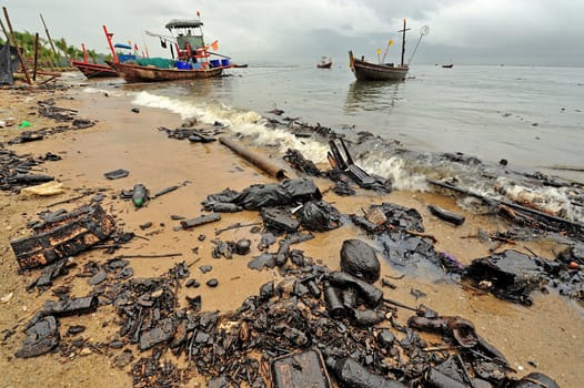 oil polution on the beach, Thailand