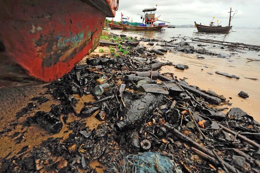 Oil spill. Contaminated Beach in Chonburi, Thailand.