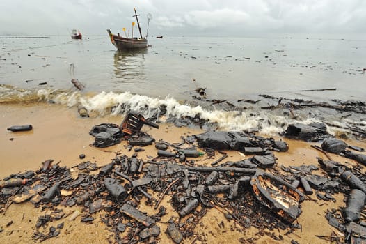 oil polution on the beach, Thailand