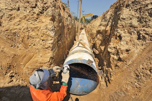 water pipes and worker on duty