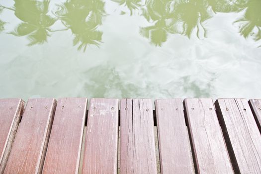 the wooden bridge beside the river