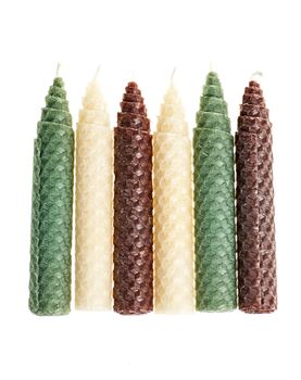 Colorful beeswax candles isolated on white background