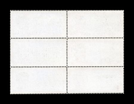 Blank Postage Stamp Sheet isolated over a black background.