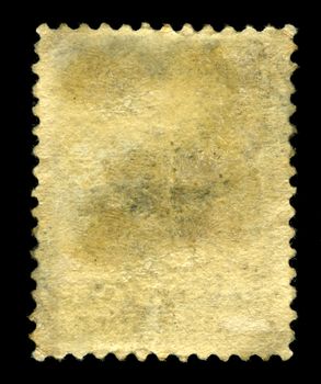 The reverse of an old and worn Postage Stamp.