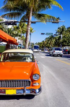 MIAMI BEACH - MARCH 20. Vintage Car Parked along Ocean Drive in the Famous Art Deco District in South Beach. South Beach, FL, March 20, 2011. 