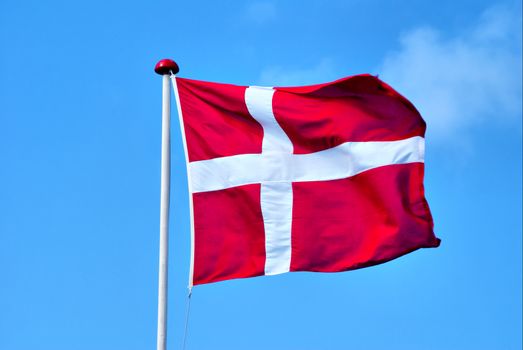 A Danish Flag in the wind. Dannebrog.