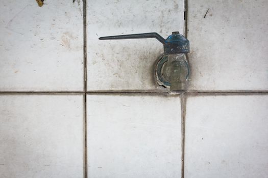 The faucet on white Flagstone