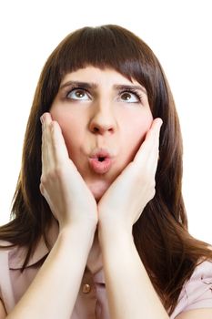 Surprised young woman on an isolated white background