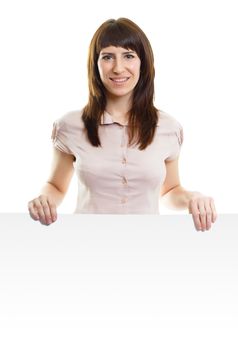 Attractive young woman with a poster on an isolated white background