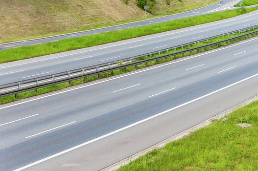 Empty modern dual carriageway with no traffic