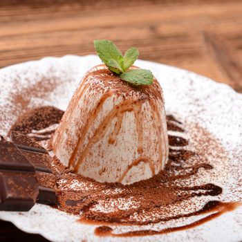 Italian dessert panna cotta with chocolate