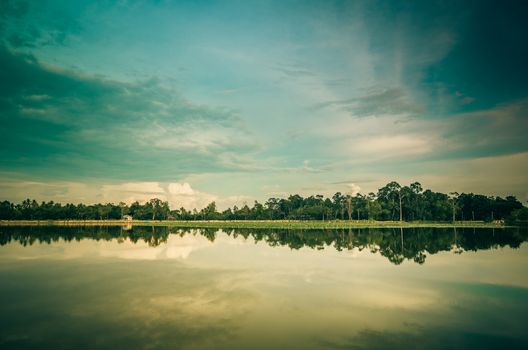 Pond and clouds in spring nature landscape in Thailand