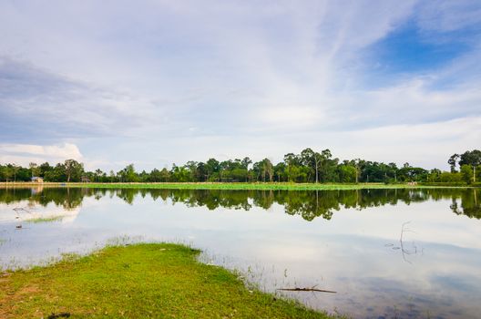 Pond and clouds in spring nature landscape in Thailand