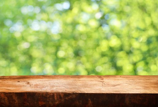 Empty wooden table and summer background