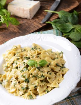 Farfalle pasta with fresh spinach and gorgonzola cheese