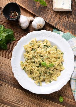 Farfalle pasta with fresh spinach and gorgonzola cheese