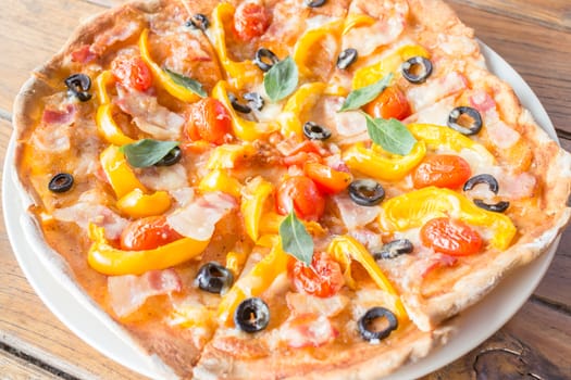 Homemade pizza with fresh tomato olive and cheese, stock photo