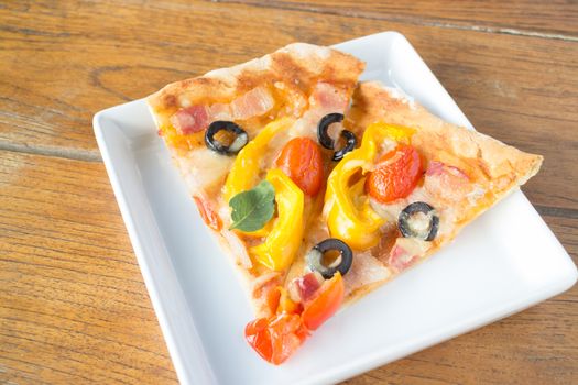 Homemade pizza with fresh vegetable topping, stock photo