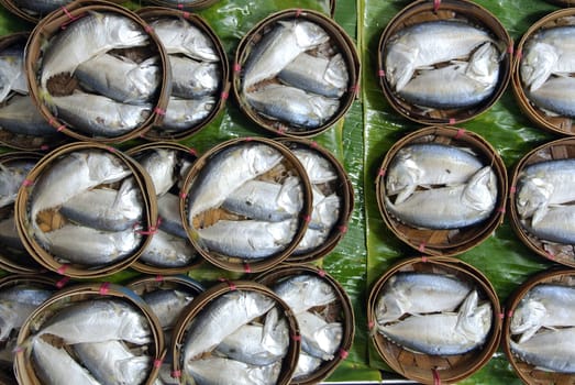 Mackerel fish in bamboo basket at market, Thailand