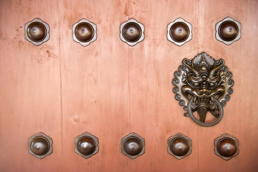 Hang Door Knocker Metal in Nunnery temple, Hong Kong.
