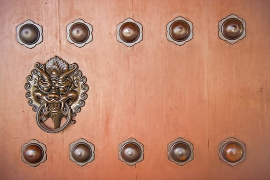 Hang Door Knocker Metal in Nunnery temple, Hong Kong.