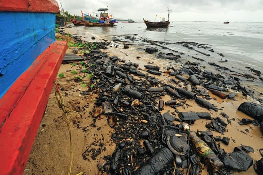 oil polution on the beach, Thailand