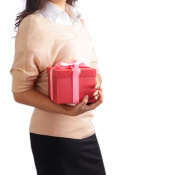 Young woman holding gift box