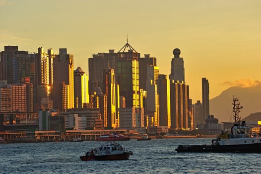 Skyline of Hong Kong at sunset.