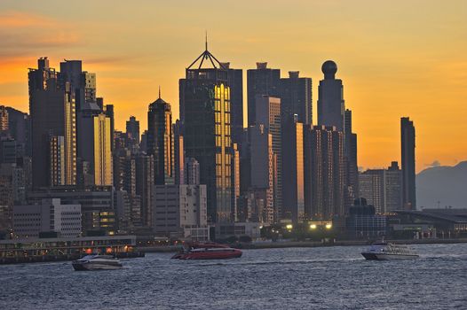 Skyline of Hong Kong at sunset.