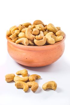 cashews nut in bowl on white background