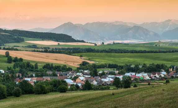 nature landscape with woods and mountains, view towards low tatra mountains (poludnica, demanovska mount)