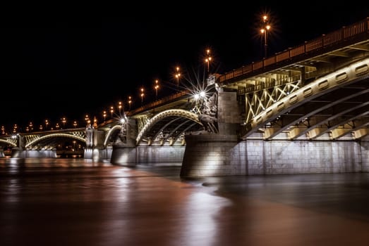 Margit híd or Margaret Bridge is a bridge in Budapest, Hungary, connecting Buda and Pest across the Danube river. It is the second northernmost and second oldest public bridge in Budapest.