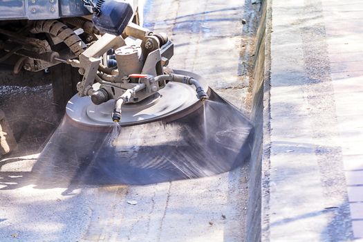 Street sweeper machine cleaning the streets