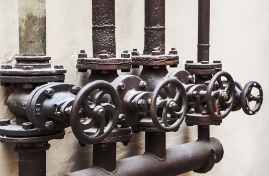 a a group of key pipelines inside a factory