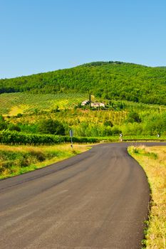 Winding Paved Road in the Tuscany, Italy