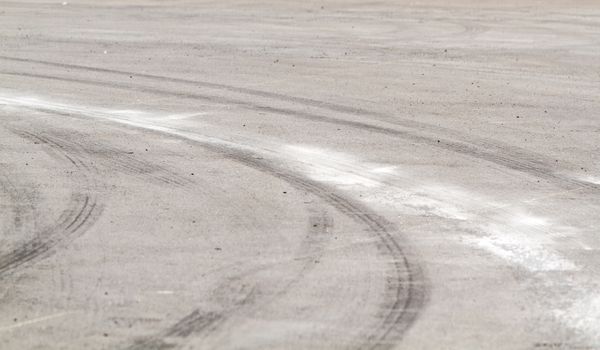 Tire marks on road track for background