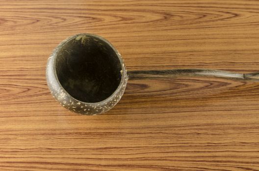 thai wood bowl container for drinking water on wood background