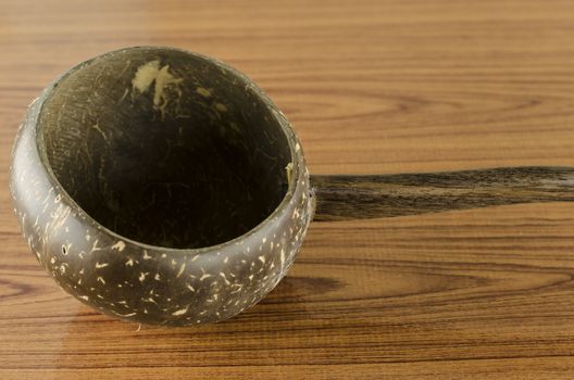 thai wood bowl container for drinking water on wood background
