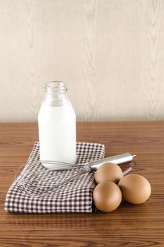 whisk egg and milk concept tools for baking beakery