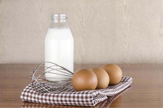 whisk egg and milk concept tools for baking beakery