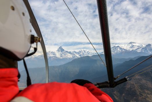 Pilot flying an ultralight in Nepal